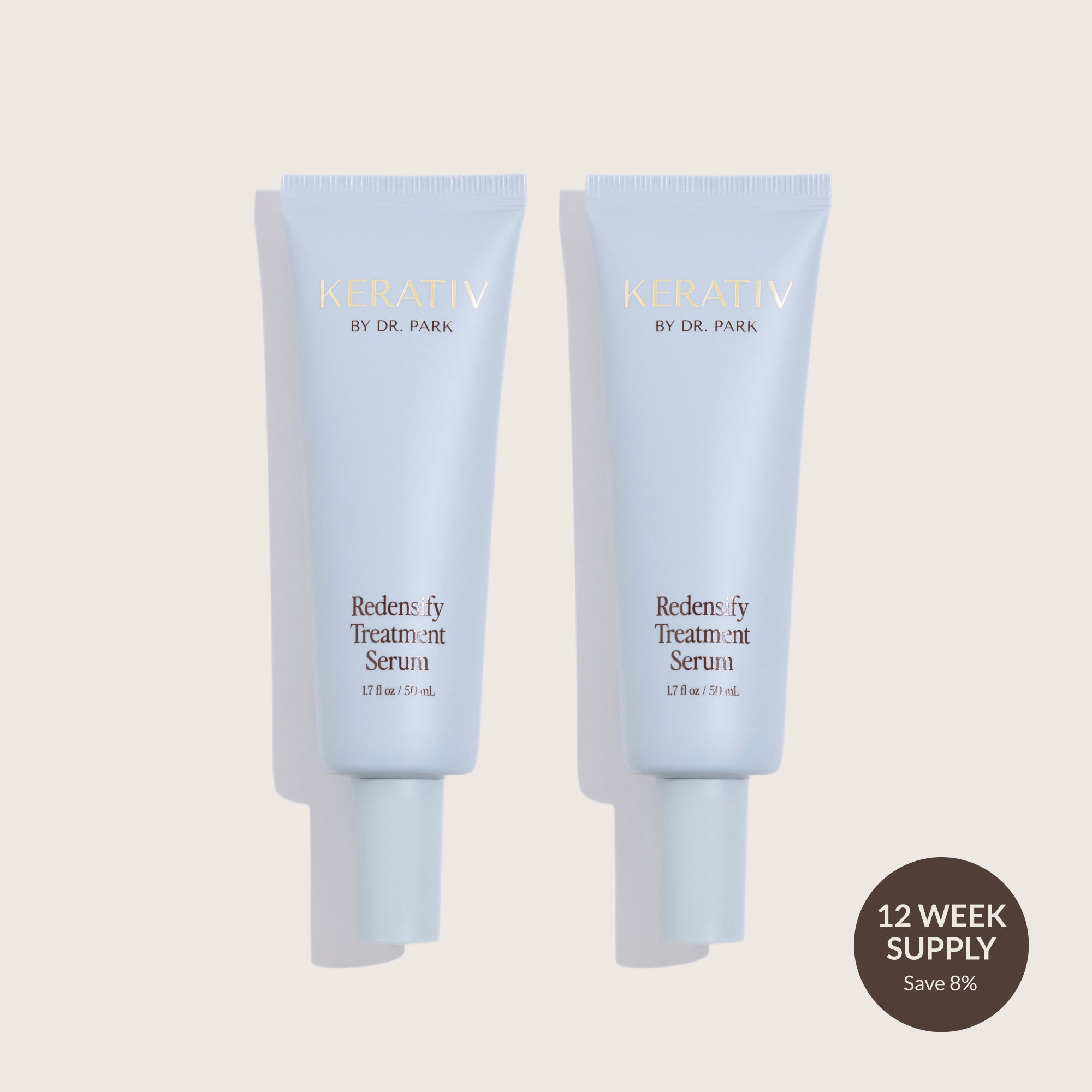 Two side-by-side Kerativ Redensify Treatment Serums in minimalistic pale blue tubes with text about supply and sales